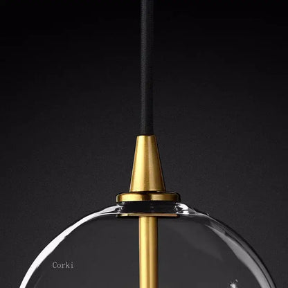 A sleek modern brass glass ball pendant light with clear glass dome for kitchen decorbites glass ball pendant lighting