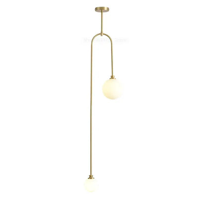 Modern brass glass ball pendant lights featuring two frosted globes on slender curved arms for dining room decorbites