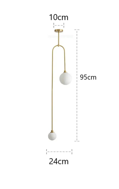 Modern brass glass ball pendant lights featuring gold-toned minimalist design with frosted white glass globes for dining room decorbites glass ball pendant lights