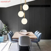 Modern asanzuo brass glass ball pendant lights with gold metal rods and frosted spheres for kitchen decorbites decor