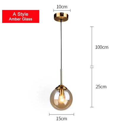 Modern brass glass ball pendant set featuring an amber decorbites glass ball pendant with gold-finished fixture for bedroom lighting