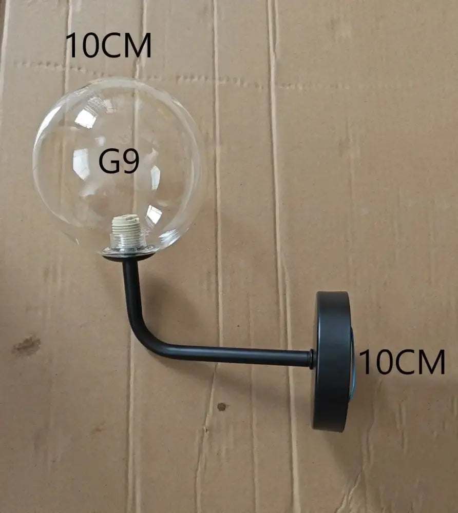 Black metal wall lamp with decorbites glass ball clear globe housing for modern amber globe bedroom lighting decor