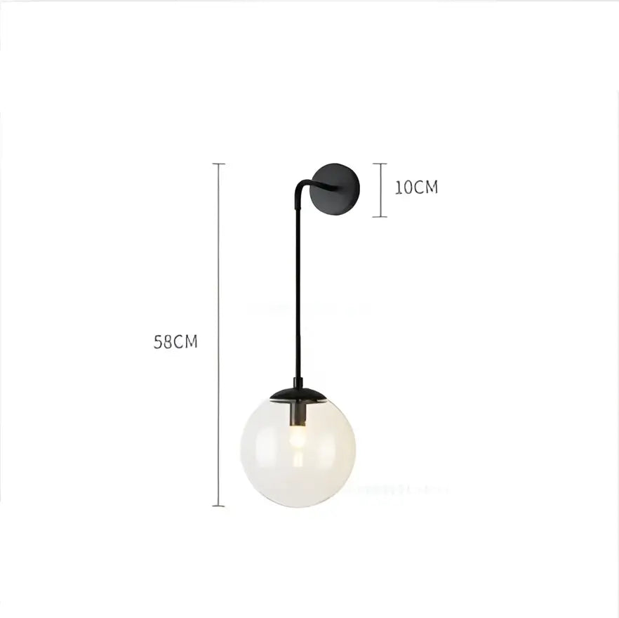 Black metal wall lamp with a frosted glass ball globe featuring decorbites glass ball design for modern bedroom lighting