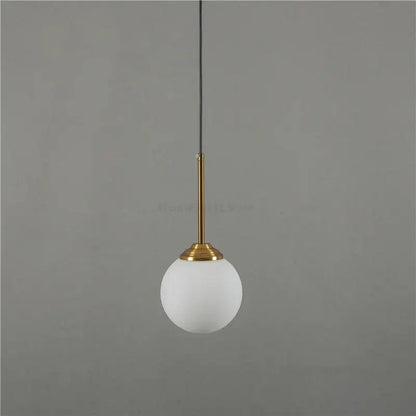 Minimalist modern brass glass ball wall lamps with frosted white glass globe pendant light for bedroom decorbites