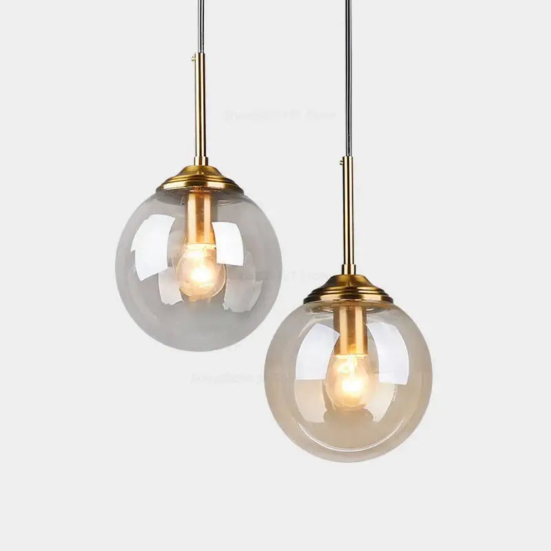Two elegant modern brass glass ball wall lamps with spherical smoked glass shades for bedroom decorbites glass ball lighting