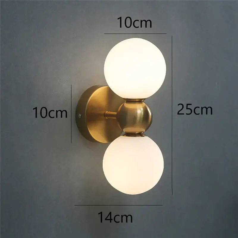 Modern brass wall lamps with frosted glass ball wall shades for elegant bedroom decorbites glass ball lighting
