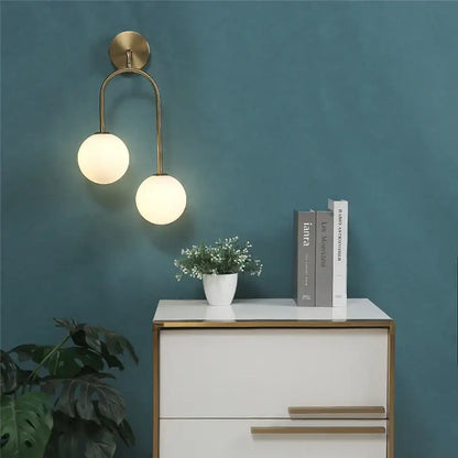Modern brass wall lamps with two frosted glass ball globes for bedroom decorbites glass ball wall lighting