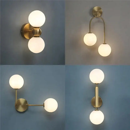 Modern brass glass ball wall lamps featuring frosted glass globe shades for elegant bedroom sconce lighting decorbites