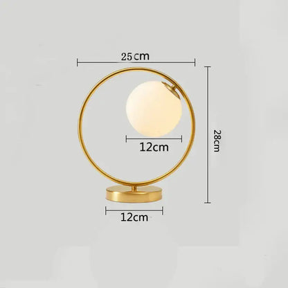 Modern brass glass led table lamp with gold-toned circular frame frosted globe for bedroom reading desk decorbites brass glass