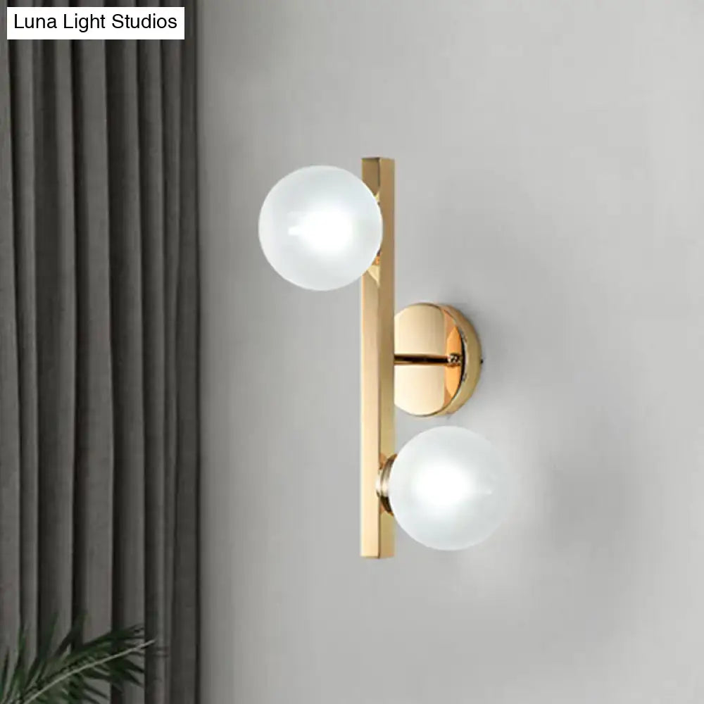 Modern brass globe wall lamp with gold-toned finish and two frosted glass globe shades 220v-240v wall light