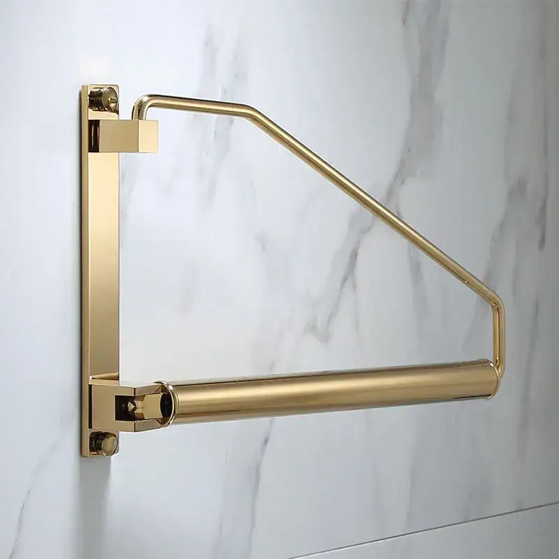 Modern brass gold wall clothing rack in sleek metal with polished finish for bedroom hanging organizer decorbites brass gold