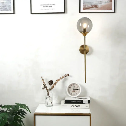 Modern brass golden glass wall sconces with clear globe shade for bedroom decorbites golden glass wall lighting