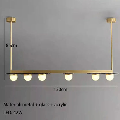 Modern brass gray glass led chandeliers with five gold-toned spherical glass led bulbs for dining room pendant lighting