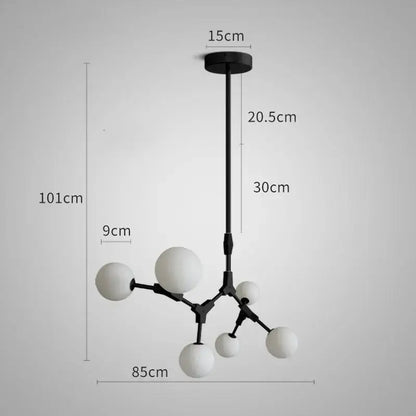 Black metal pendant lights with white spherical glass shades in iron magic molecular design for modern dining room decorbites
