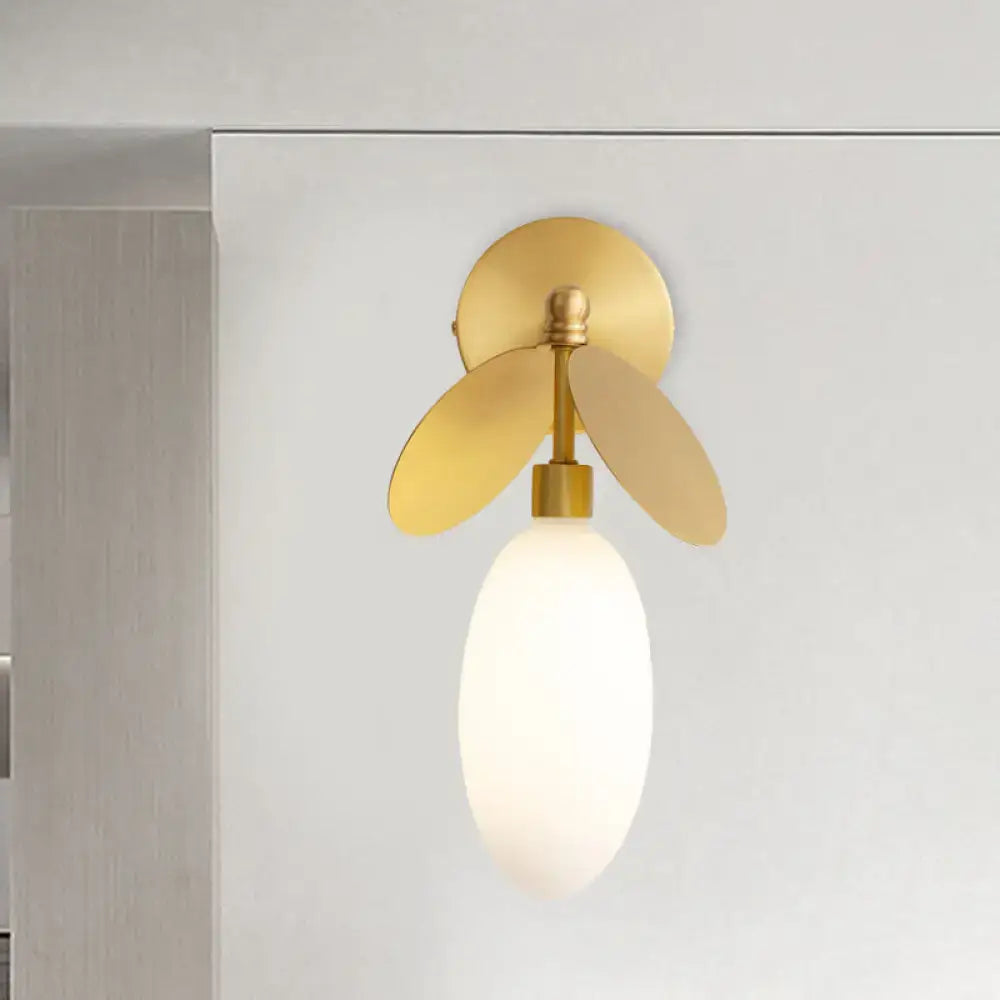 Modern brass leaf wall lamp with cream glass globe and gold-toned metal fins for 220v-240v 110v-120v bedroom sconce
