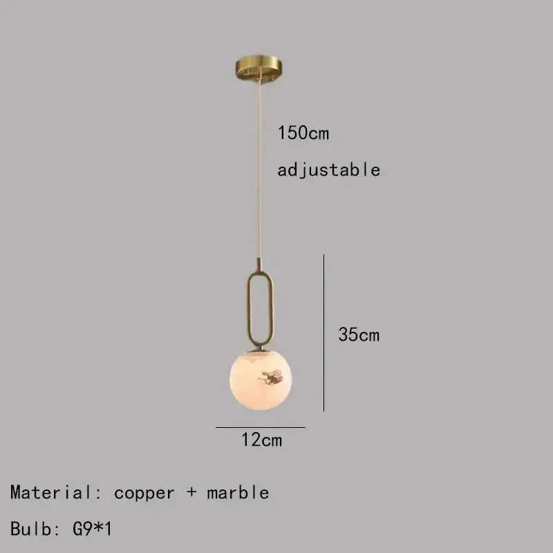 Minimalist brass led pendant light with copper frame and off-white marble globe featuring gold leaf decorbites brass led