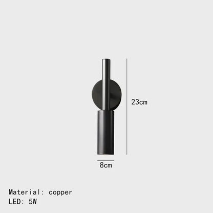 Black copper modern brass led wall lamp with sleek cylindrical design and circular mounting plate for bedroom decorbites brass led wall