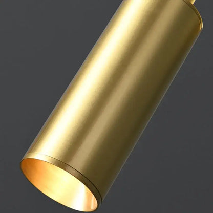 Modern brass led wall lamp with rotatable cylindrical brass led wall sconce featuring a polished metallic finish and warm glow
