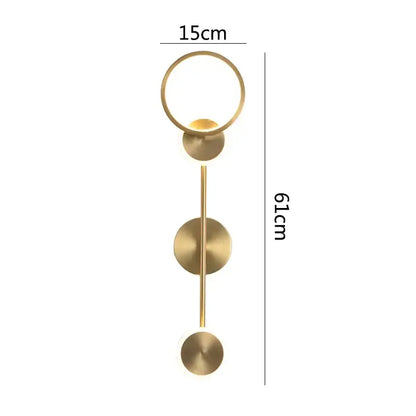 A modern brass led wall light with a gold-toned circular top ring and three disc accents for living room decorbites brass led