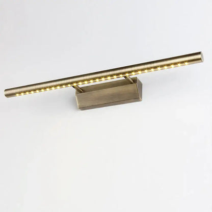 A modern brass led wall mounted light fixture with a brushed finish and warm white lights for bathroom vanity lighting