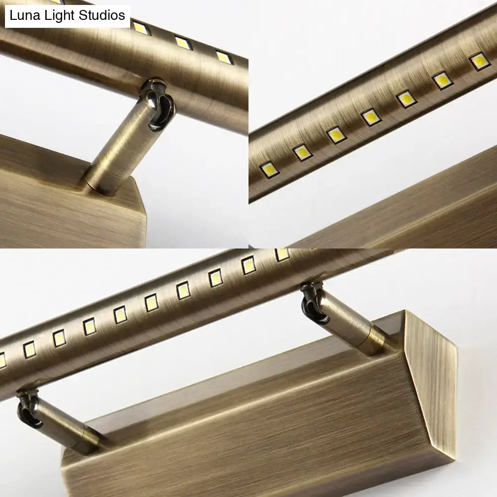 Modern brass led wall mounted light fixture with brass finish, brushed metal, and square-shaped bulbs for bathroom vanity lighting