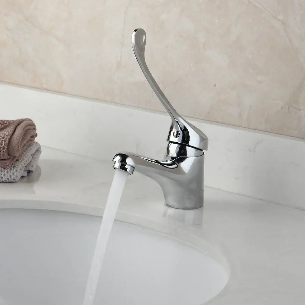 Modern brass long handle basin faucet with chrome finish, sleek curved spout, and elegant brass long handle decorbites design