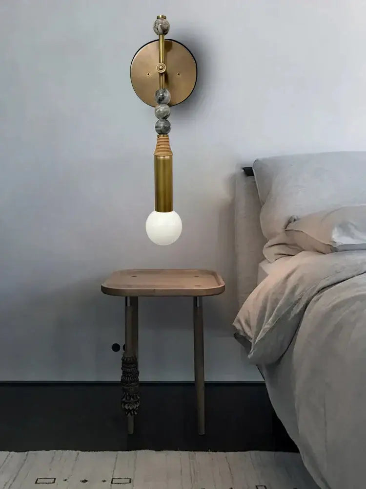 Modern brass marble ball wall sconce with polished gold finish and gray white marble beads for bedroom decorbites brass marble
