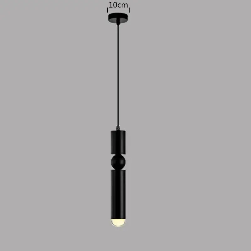 Black cylindrical decorbites brass pendant light with sleek modern design and warm glow for minimalist kitchen decor