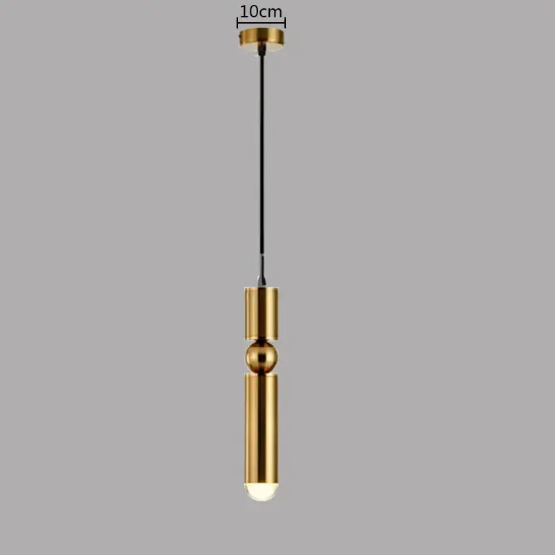 Modern brass pendant light with gold-toned cylindrical design and black cord suspension ideal for kitchen decorbites pendant light