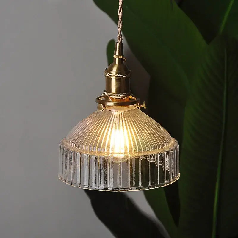 Modern brass ribbed clear glass pendant lamp with warm glow for dining room decorbites clear glass lighting