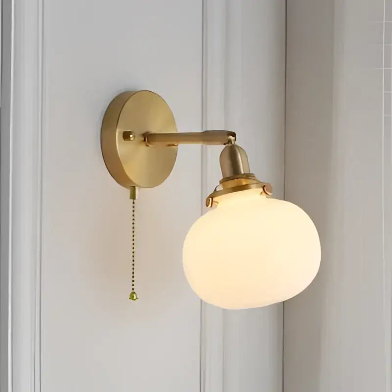 Modern brass ribbed glass ball wall sconce with frosted decorbites glass ball shade and pull chain for bedroom light