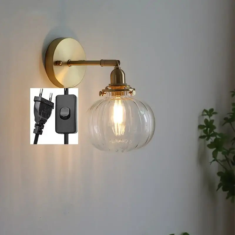 Modern brass ribbed glass ball wall sconce with clear globe and exposed filament bulb for bedroom decorbites glass ball wall