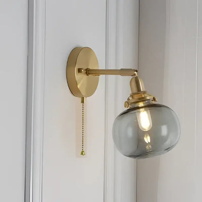 Modern brass ribbed glass ball wall sconce with gold finish frosted glass globe and exposed bulb for bedroom decorbites glass ball