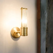 Modern brass ridged crystal wall light with cylindrical glass shade and brass finish wall light fixture height design