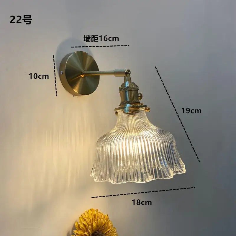 Vintage-style modern brass wall sconce with decorbites clear glass and ribbed clear glass led shade for bathroom light