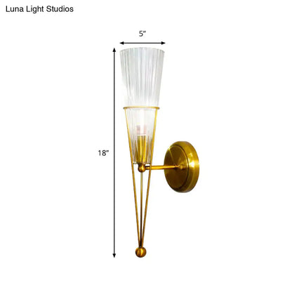 Modern brass sconce light with clear crystal fluted glass shade and gold metal frame suitable for e12 e14 bulbs