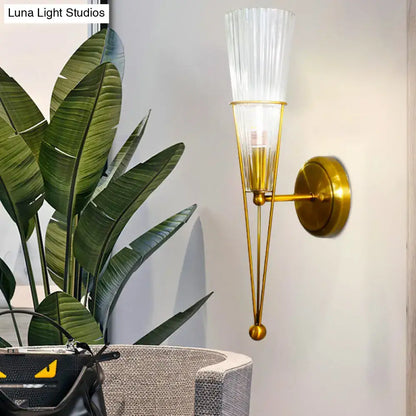 Modern brass sconce light with gold-toned metal arms and fluted clear crystal glass shade for e12 e14 bulbs
