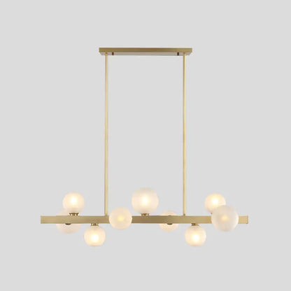 Modern brass simplicity globe pendant with frosted glass bulbs ideal for dining room lighting fixtures