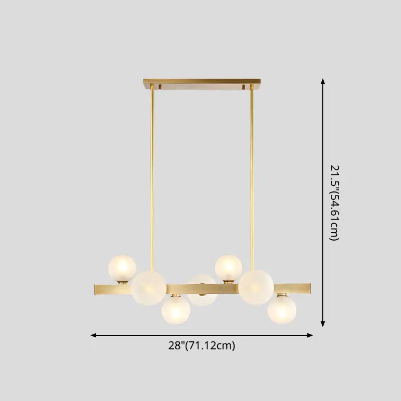Modern brass simplicity globe pendant with six frosted glass bulbs in a linear design for dining room lighting