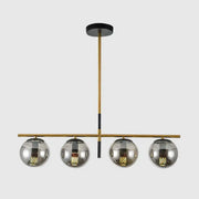 Modern brass and smoke grey globe chandelier with four reflective chrome shades for kitchen island lighting