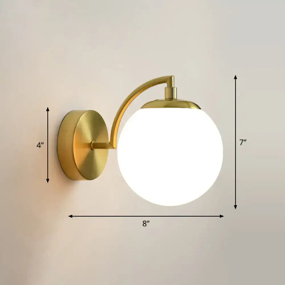 Modern brass stairway wall lighting fixture featuring a gold-toned wall sconce with frosted glass shade and curved arm compatible with e26 e27 bulb