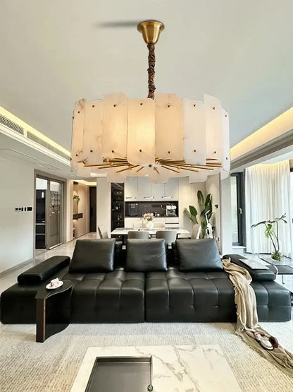 Modern brass stone pendant light with brass-finished top and off-white panels for dining room decorbites brass stone pendant