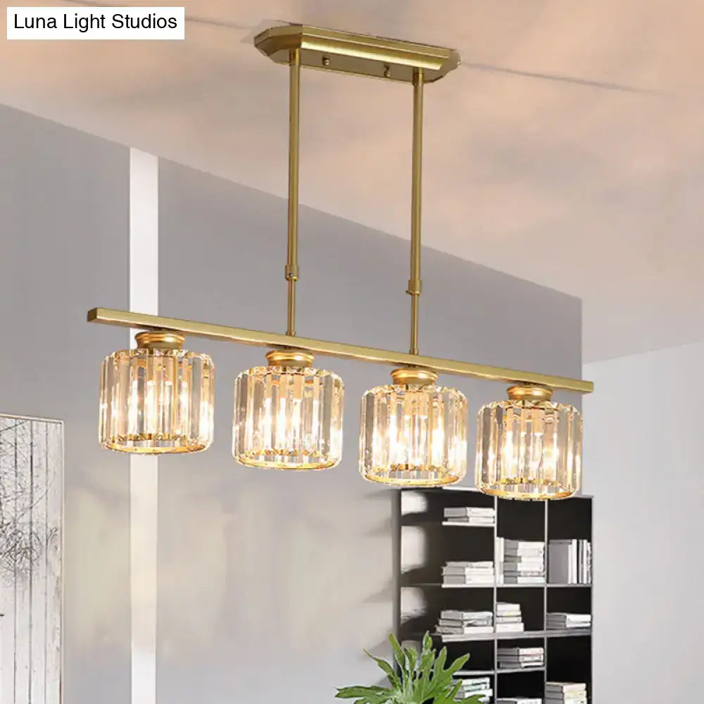 Modern brass triple crystal ceiling pendant light with gold-toned cylindrical shades and adjustable chain cord length for dining room