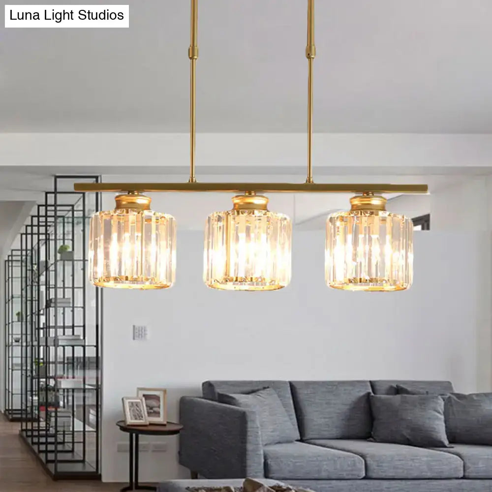 Modern brass triple crystal ceiling pendant light with gold-toned finish and adjustable chain cord length for dining room