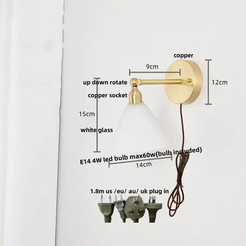 A sleek modern brass wall lamp with clear glass shade and copper sconce for bedroom reading decorbites clear glass