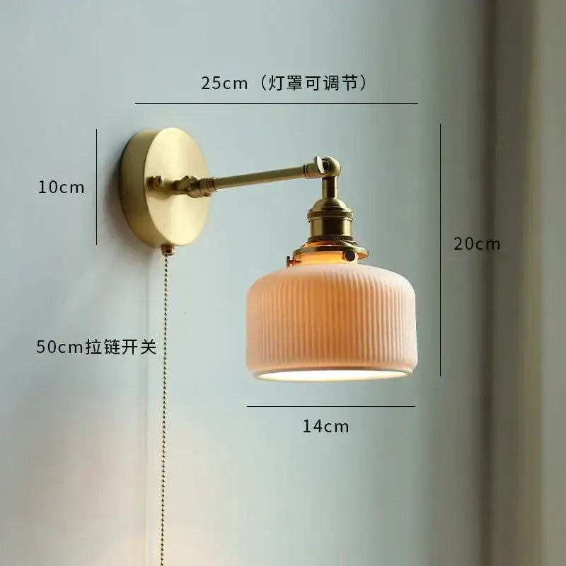 Modern brass wall lamp with ribbed off-white ceramic shade and adjustable copper arm for bedroom reading light decorbites copper arm