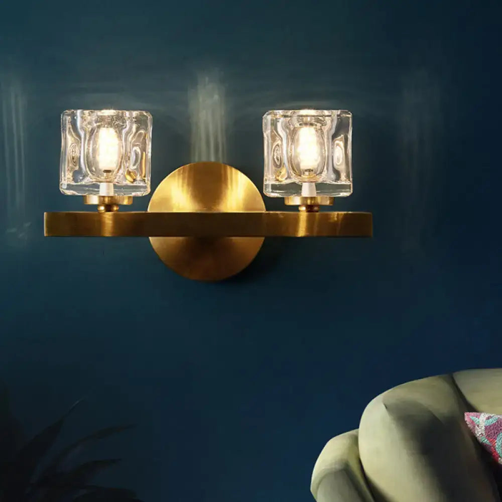 Modern brass wall light with clear crystal block textured glass cube shades for living room lighting