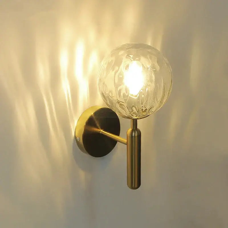 Modern brass wall lights with brass finish wall lamps and decorbites glass ball featuring clear textured glass globe