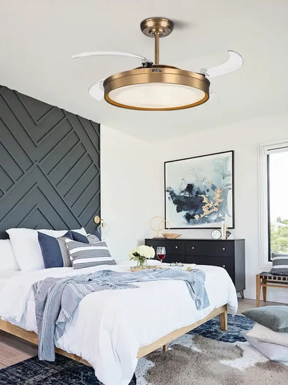 Modern bronze circular ceiling fan light with brass finish, white reversible blades, and integrated fan light for living room