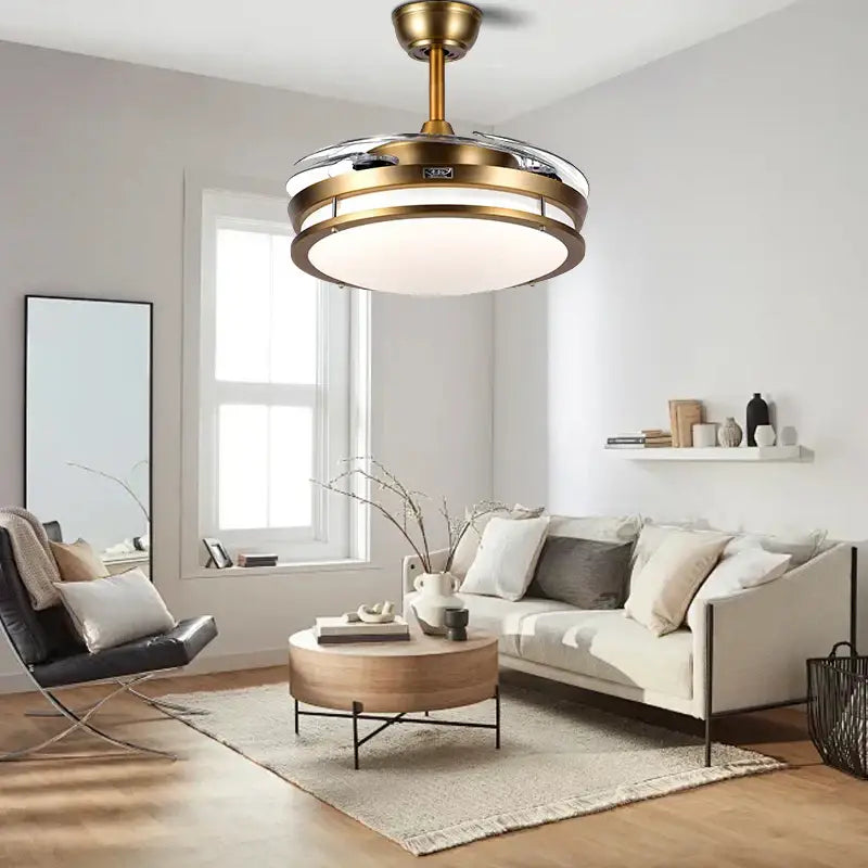 Brass-finished modern bronze circular ceiling fan with integrated ceiling fan light and reversible blades for living room use